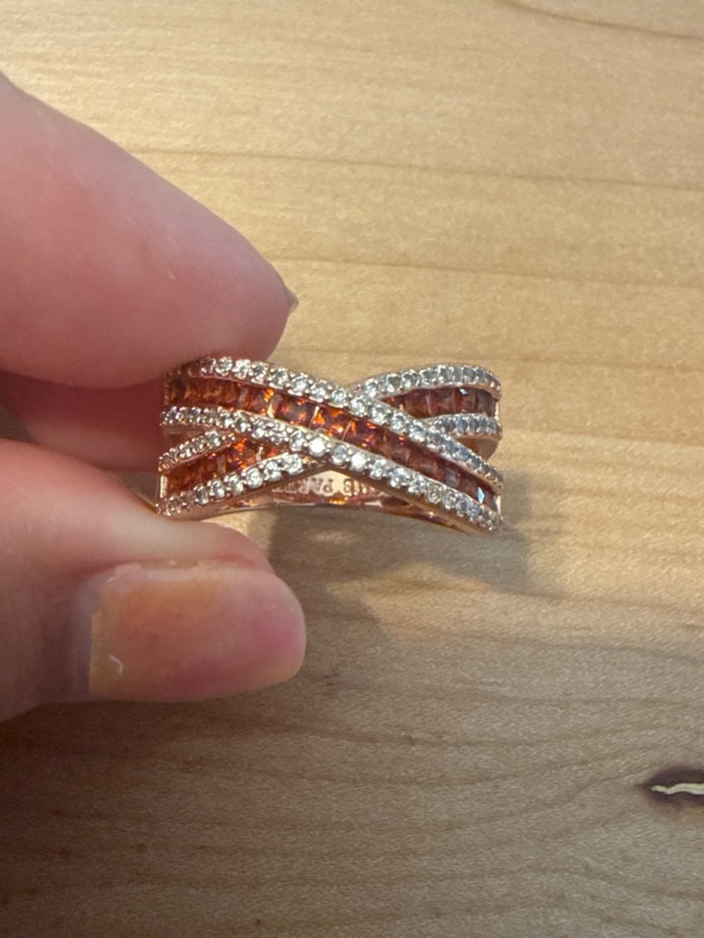 Rose Gold Crossed Band Ring with Garnet and Clear Stones